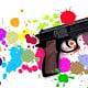 Toy gun on paint-splattered background