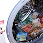 Money in a washing machine, getting laundered