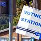 Sign pointing to a voting station