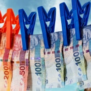 Laundered South African banknotes hanging on the washing line