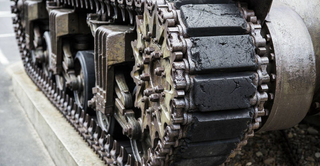 Closeup treads of a military tank