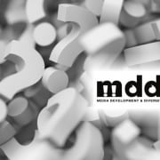 Logo of the Media Development and Diversity Agency against a question mark background