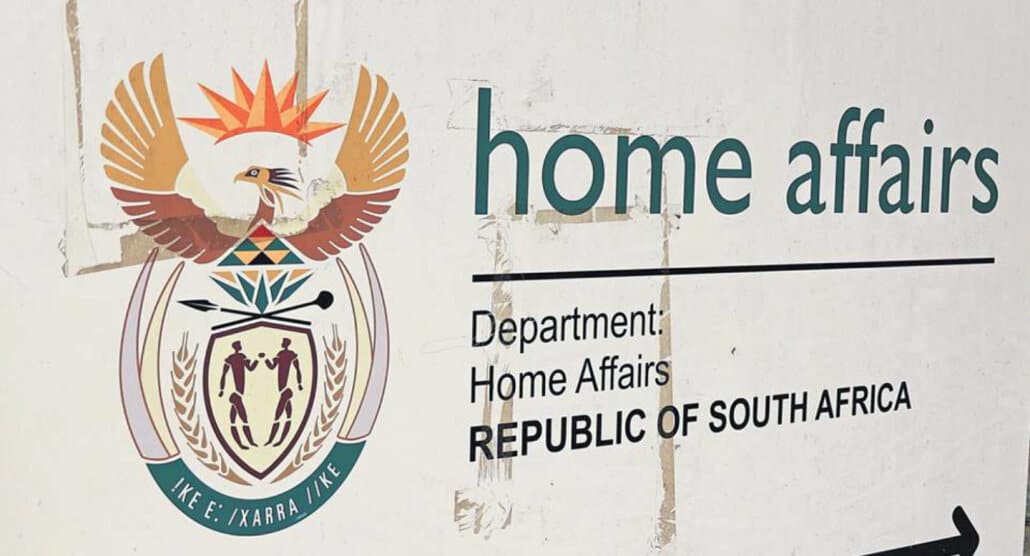 A sign for the South African Department of Home Affairs.