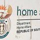 A sign for the South African Department of Home Affairs.